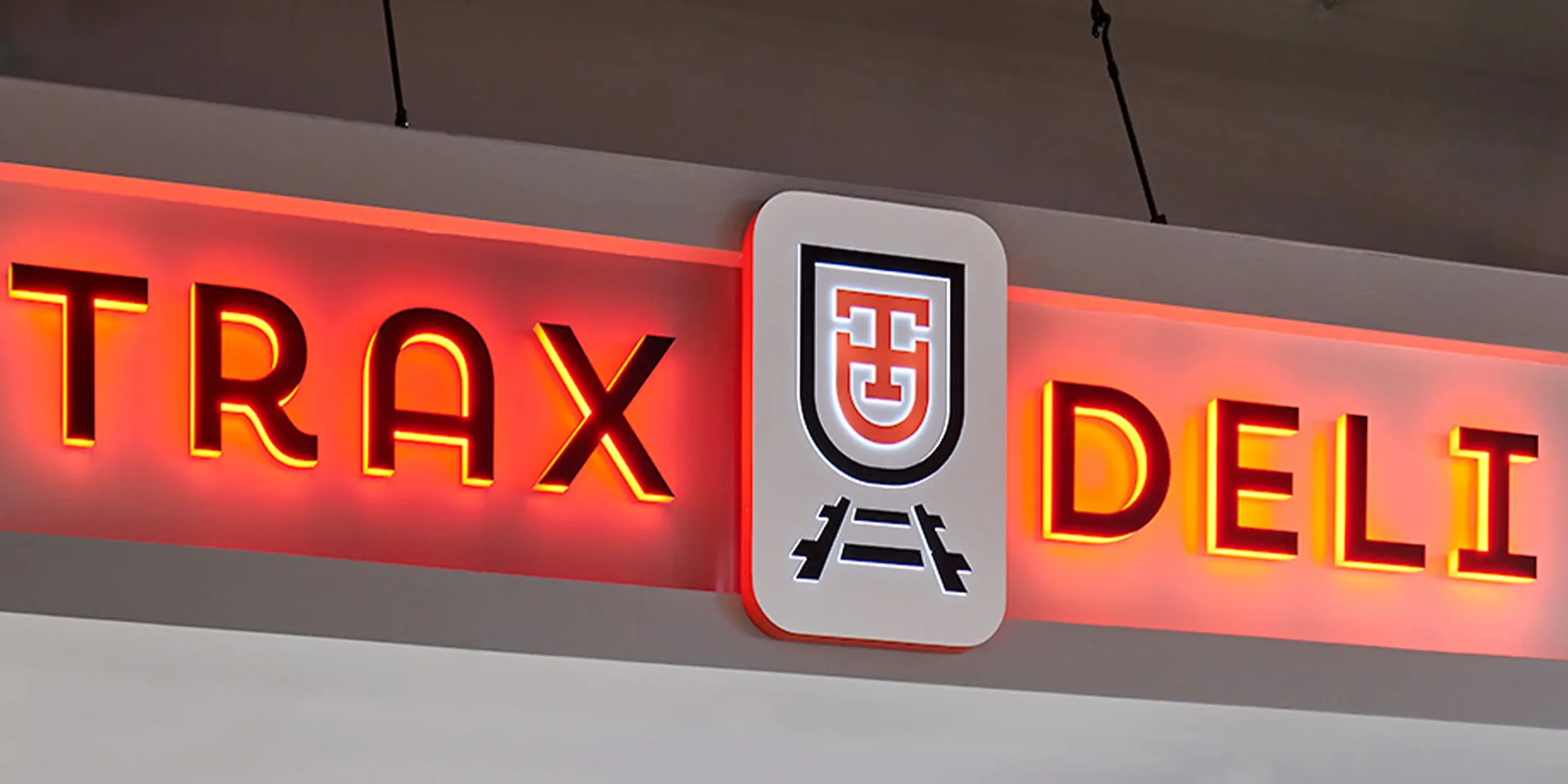 Trax Deli, Branding and Signage